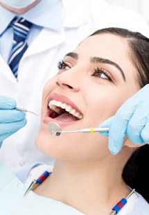 a patient receiving dental care from a dentist near Tyler